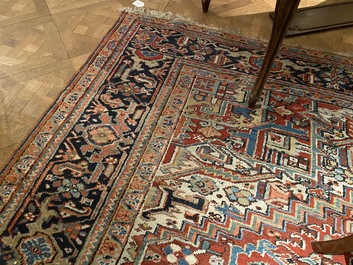 A large rectangular ornamental Heriz rug, 19/20th C.