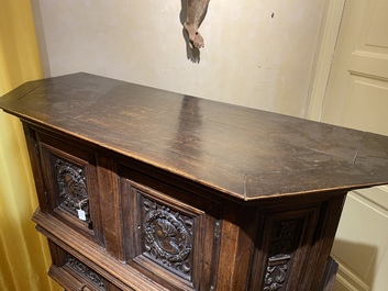 A walnut 'credence' case with portrait medallions, probably France, late 17th C. with later elements