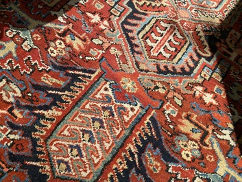 A large rectangular ornamental Heriz rug, 19/20th C.