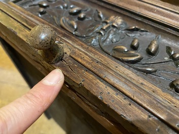 A walnut 'credence' case with portrait medallions, probably France, late 17th C. with later elements