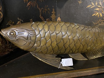 A Japanese bronze patinated koi sculpture, 19/20th C.