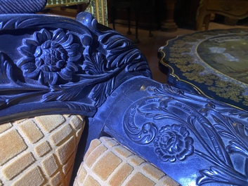 An Anglo-Indian colonial carved wooden sofa with two matching chairs, late 19th C.