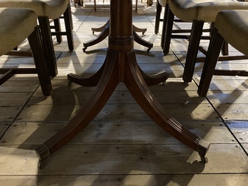 A large English mahogany dining table, 20th C.