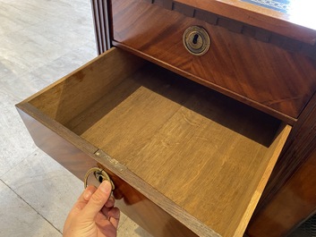 An English neoclassical leather-topped mahogany library desk with gilt bronze mounts, 19th C.