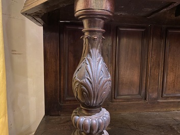 A walnut 'credence' case with portrait medallions, probably France, late 17th C. with later elements