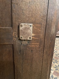 A rare German carved oak sculptural cupboard on diagonal supports with recumbent lions, Westphalia, 16th C.