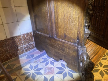 A rare German carved oak sculptural cupboard on diagonal supports with recumbent lions, Westphalia, 16th C.