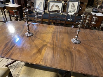 A large English mahogany dining table, 20th C.