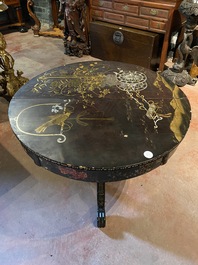 A black lacquered table with polychrome chinoiserie design and mother-of-pearl inlay, ca. 1900