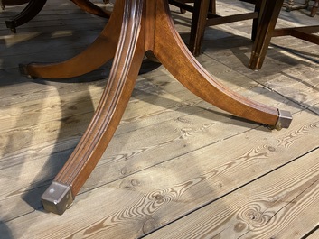 A large English mahogany dining table, 20th C.