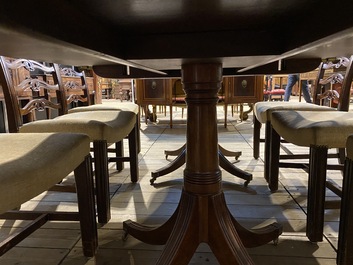 A large English mahogany dining table, 20th C.