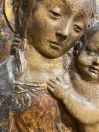 An Italian polychrome stucco relief with Madonna with Child, possibly Florence, 16/17th C.