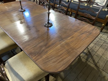 A large English mahogany dining table, 20th C.