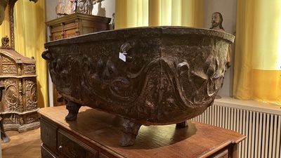 A large Chinese cast iron jardini&egrave;re on four lion feet, 19th C.