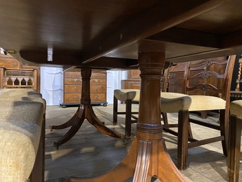 A large English mahogany dining table, 20th C.