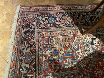 A large rectangular ornamental Heriz rug, 19/20th C.