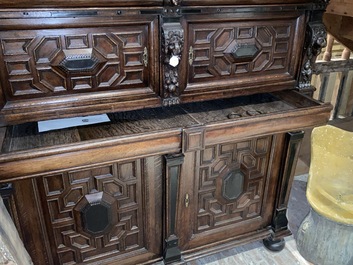 A Flemish ebonised and oak wooden four-door cabinet, 17th C.