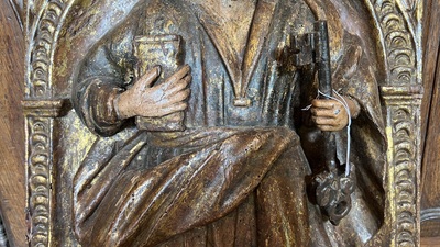 A Spanish polychrome and gilt wooden alto relievo depicting Saint Peter under an arcade, 17th C.