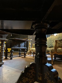 A black lacquered table with polychrome chinoiserie design and mother-of-pearl inlay, ca. 1900