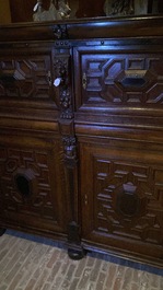 A Flemish ebonised and oak wooden four-door cabinet, 17th C.