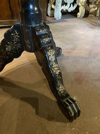 A black lacquered table with polychrome chinoiserie design and mother-of-pearl inlay, ca. 1900