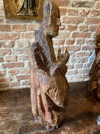 A walnut Virgin from an Annunciation, Southern Netherlands, early 16th C.