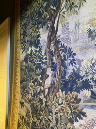 A French Aubusson wall tapestry with a wolf battling a fox in a forest setting with castle view, 19th C.