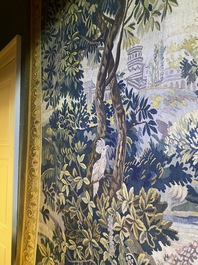 A French Aubusson wall tapestry with a wolf battling a fox in a forest setting with castle view, 19th C.