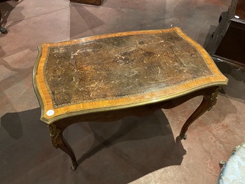 A French Louis XV gilt bronze-mounted mahogany veneer leather-topped writing desk, 18/19th C.