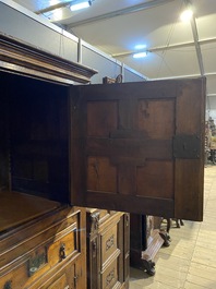 An English Jacobean-style four-door cabinet, 19th C.