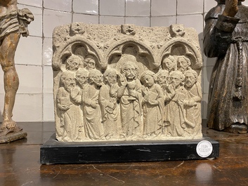 A sandstone relief depicting Christ and the twelve apostles, 20th C.