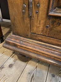 An English Jacobean-style four-door cabinet, 19th C.