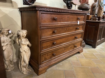 A walnut four-drawer commode, 19th C.