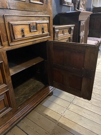 An English Jacobean-style four-door cabinet, 19th C.