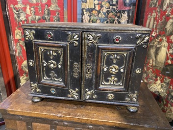 An ebonised and inlaid wooden cabinet, 19th C.