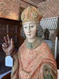 A large German polychromed oak figure of a bishop, Upper Rhine area, late 15th C.