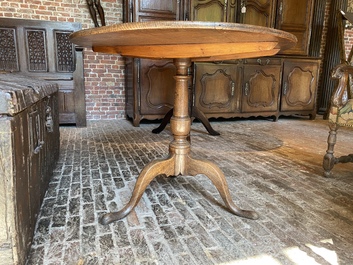 An English oak folding table, 19th C.