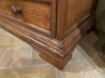 A walnut four-drawer commode, 19th C.