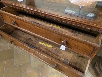 A walnut four-drawer commode, 19th C.