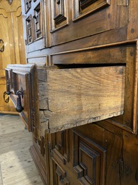 An English Jacobean-style four-door cabinet, 19th C.