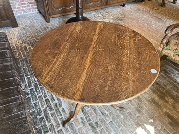 An English oak folding table, 19th C.