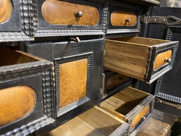 An ebonised and inlaid wooden cabinet, 19th C.