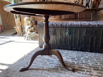 An English oak folding table, 19th C.