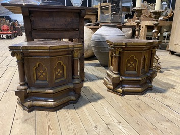 A pair of partly gilt wooden Gothic Revival stands, 19th C.