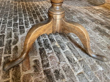 An English oak folding table, 19th C.