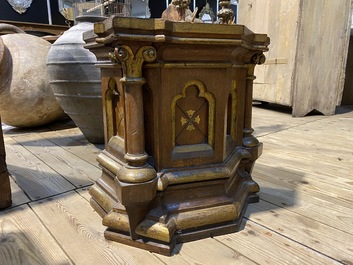 A pair of partly gilt wooden Gothic Revival stands, 19th C.