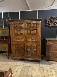 An English Jacobean-style four-door cabinet, 19th C.