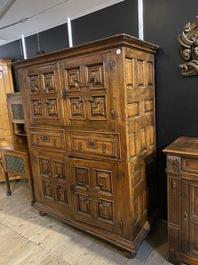 An English Jacobean-style four-door cabinet, 19th C.