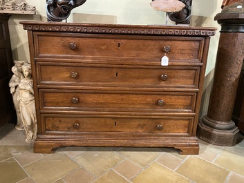 A walnut four-drawer commode, 19th C.