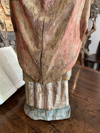 A large German polychromed oak figure of a bishop, Upper Rhine area, late 15th C.